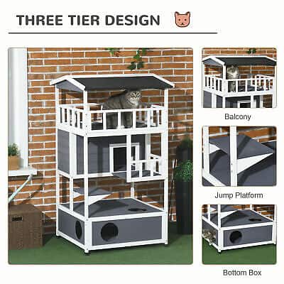 A cat house with three tiers and a cat on top.