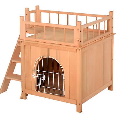A wooden dog house with a ladder.