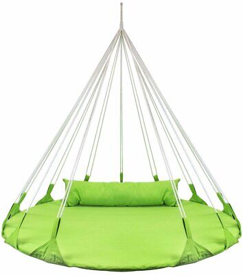 A green hammock hanging from a white background.