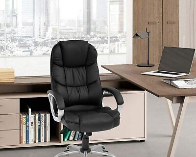 A black leather office chair in front of a desk.