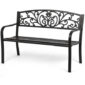 A black wrought iron bench with an ornate design.