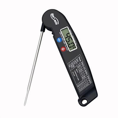 A digital food thermometer on a white background.