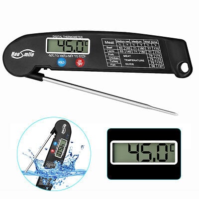 A digital thermometer with water on it.