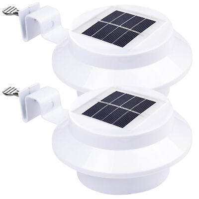 Two solar powered lights on a white background.