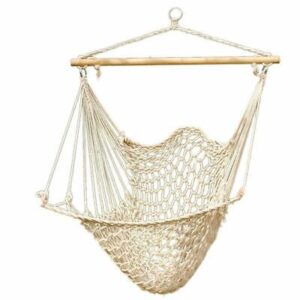 A white hammock chair hanging on a white background.