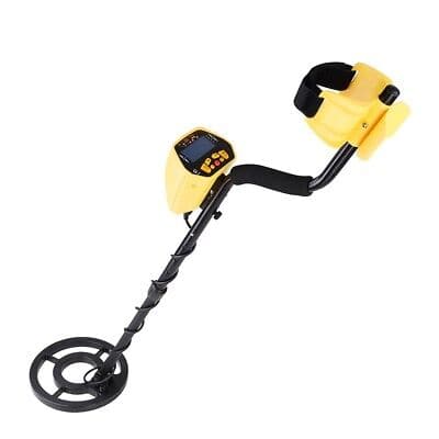 A yellow metal detector on a white background.