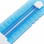 Blue plastic slide rule on a white background.