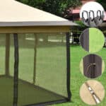 A tan gazebo with a mesh screen and different accessories.