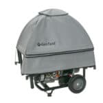 Portable generator covered with a protective canopy.