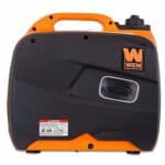 Portable generator with black and orange casing.