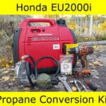 Portable honda eu2000i generator with a propane conversion kit and tools.