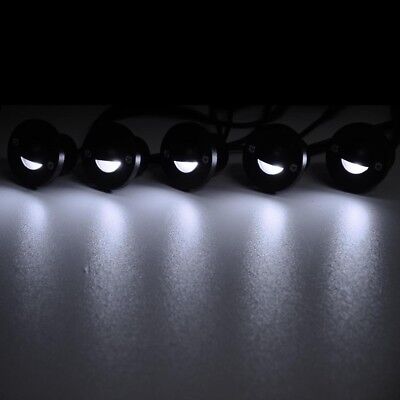 A row of white led lights on a black background.