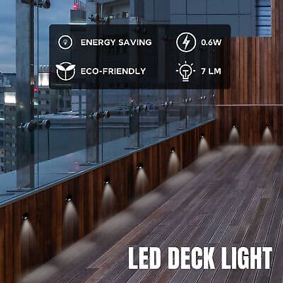 The led deck light is on a wooden deck.