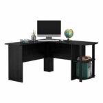 L-shaped black desk with computer, monitor, and office supplies.