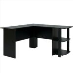 A black l-shaped office desk with shelves on one side.