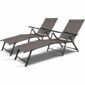 Two adjustable outdoor lounge chairs in reclined positions.