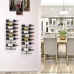 A wine rack with wine bottles on the wall.