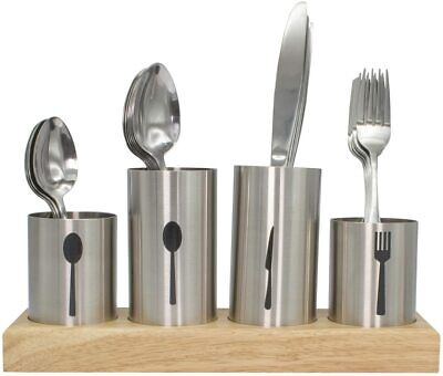 A set of stainless steel spoons and forks on a wooden base.
