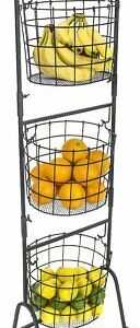 A three tier fruit rack with oranges and bananas.