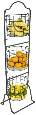 A three tier fruit rack with oranges and bananas.
