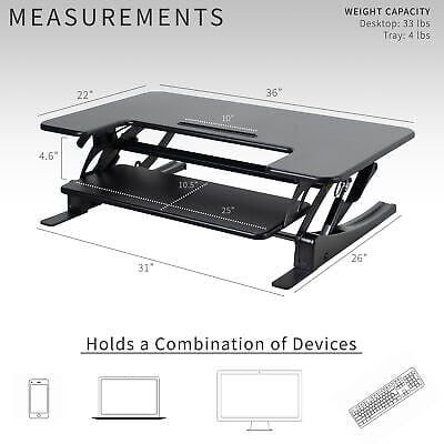 A black adjustable standing desk with measurements.