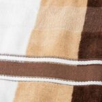 A close up of a brown and white towel.