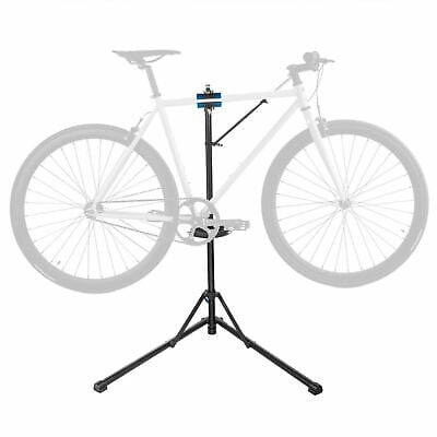 A bicycle sits on a stand on a white background.