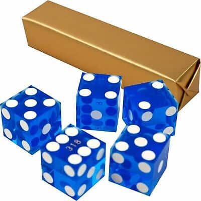 A set of blue and white dice in a gold box.