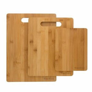 Three bamboo cutting boards on a white background.