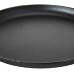 A black cast iron skillet on a white background.