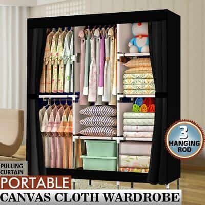 A portable canvas cloth wardrobe with clothes in it.