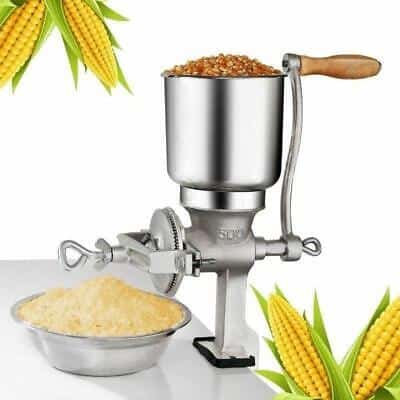 A corn grinder with a bowl of corn next to it.