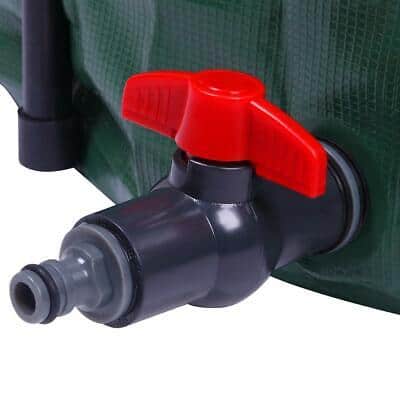 A green watering bag with a red handle.