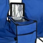 A blue folding chair with a cooler in it.