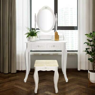 A white dressing table with a mirror and stool.