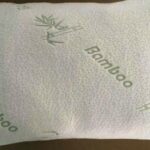 A pillow with the word bamboo on it.