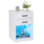 A white nightstand with a blue light on top.