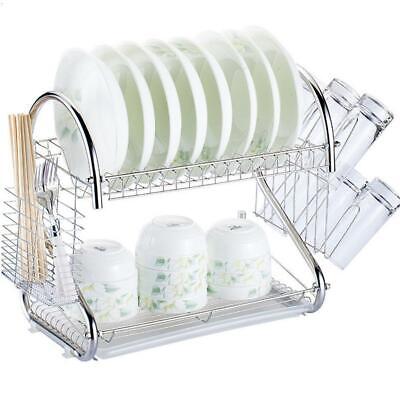 A dish rack with plates and bowls on it.