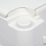 A close up of a white toilet with a lid.