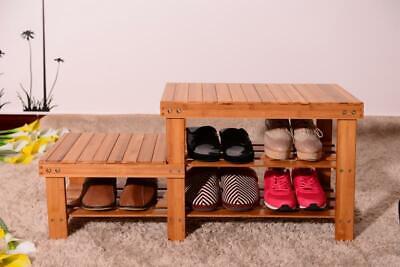 A wooden shoe rack with several pairs of shoes on it.