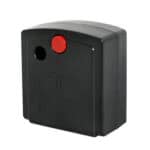 A black box with a red button on it.