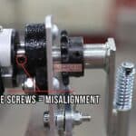 A picture of a screw on a machine.