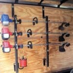 A truck with several tools hanging on the wall.