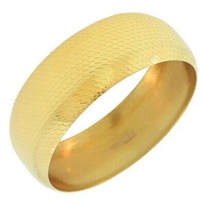A yellow gold textured bangle ring.