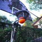 A basketball hoop with a net attached to it.