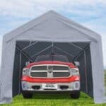 A red truck parked in a tent.