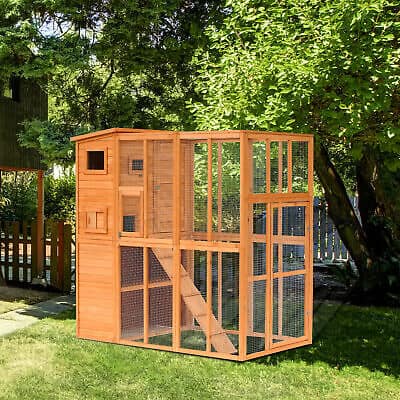 A wooden enclosure in a yard.