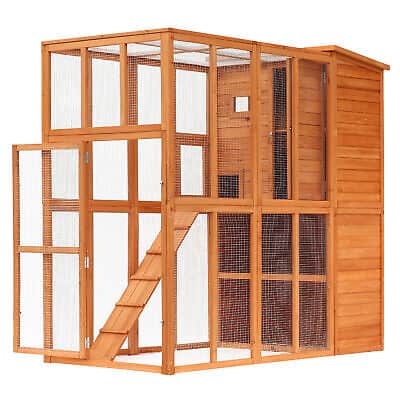 A wooden cage with a ladder.