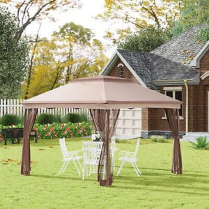 A tent with a canopy in a yard.