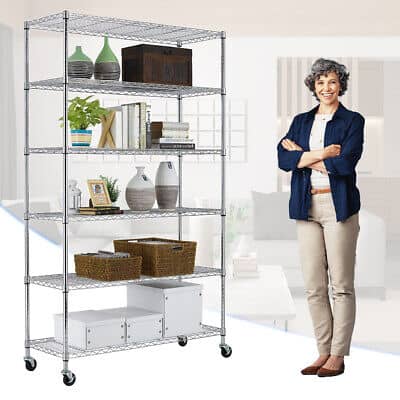 A woman standing next to a shelving unit.